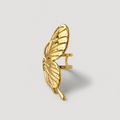 A gold butterfly-shaped ring with a textured wing design and a straight post, shown from a side angle on a light gray background.