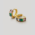 Gold earring on a white background